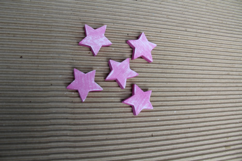 Etoiles en bois peint - Rose Nuancé