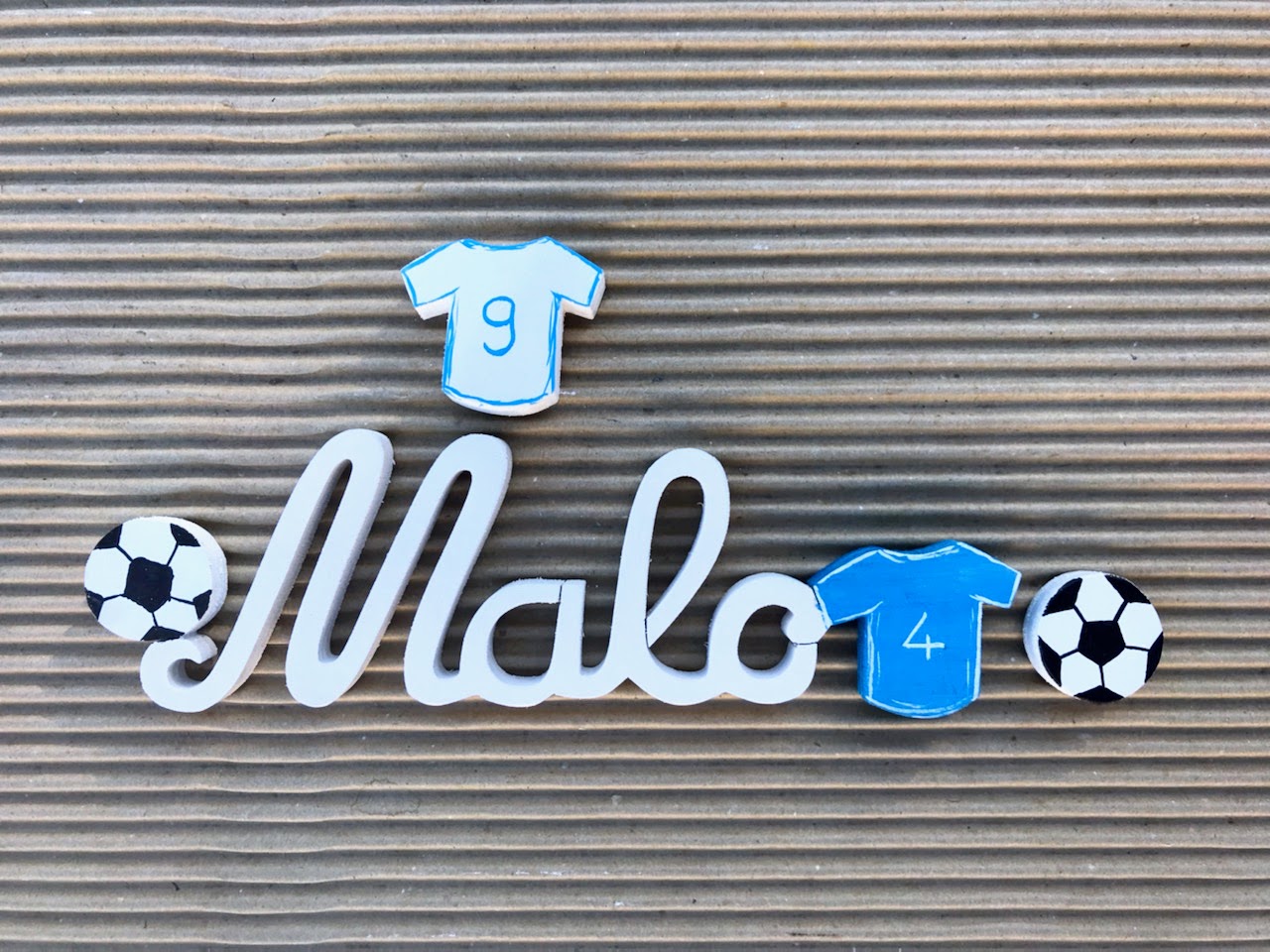 Malo Blanc uni - Maillot Bleu - L:23cm-H:7cm