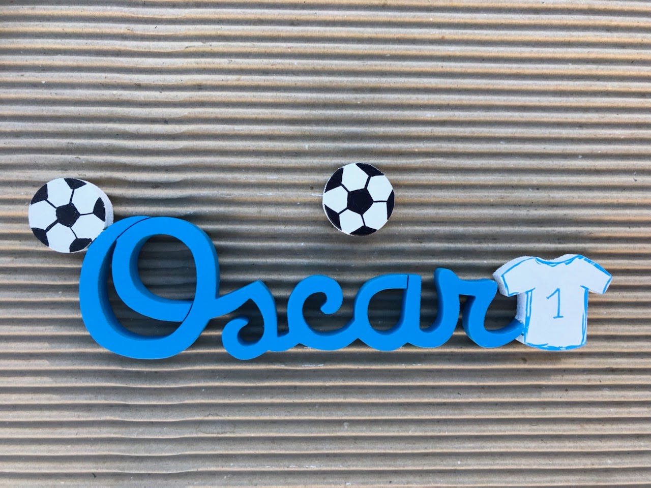 Oscar Bleu uni - Maillot Blanc - L:26cm-H:8cm