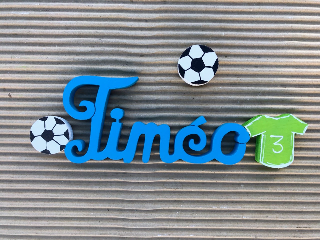 Timéo Bleu uni - Maillot Vert - L:22cm-H:7cm
